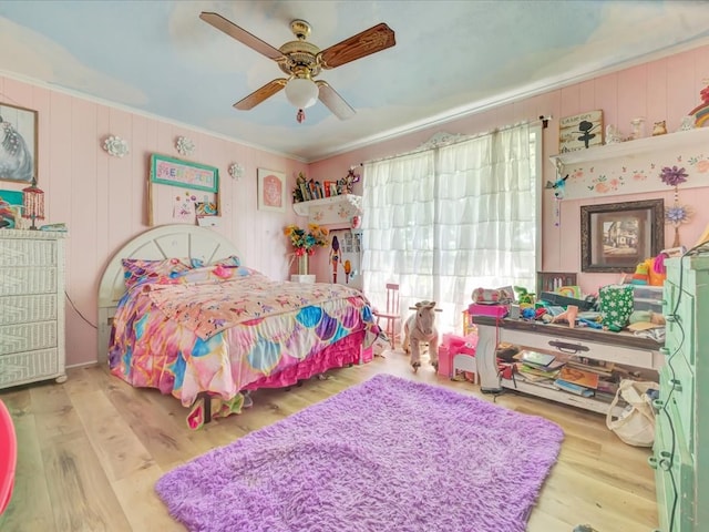 1145 State Highway 21e, San Augustine, TX 75972 - bedroom with a ceiling fan, crown molding, and wood finished floors