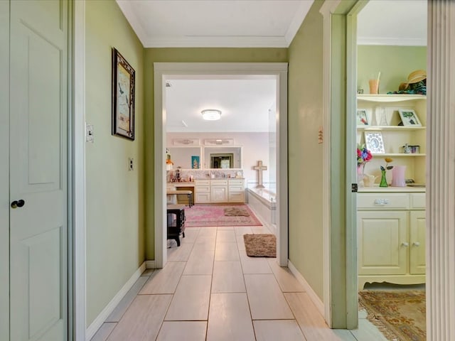 1145 State Highway 21e, San Augustine, TX 75972 - hall featuring baseboards, light tile patterned floors, and crown molding