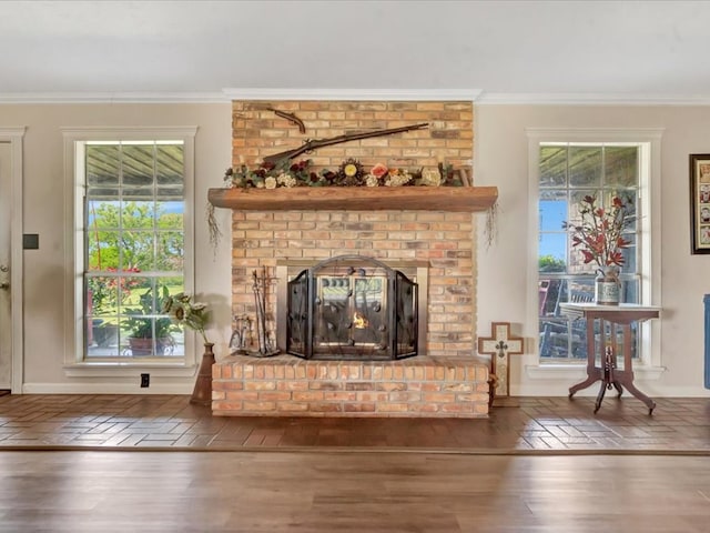 1145 State Highway 21e, San Augustine, TX 75972 - living room with brick floor, baseboards, a brick fireplace, and crown molding