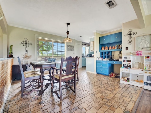 1145 State Highway 21e, San Augustine, TX 75972 - dining area featuring visible vents and crown molding