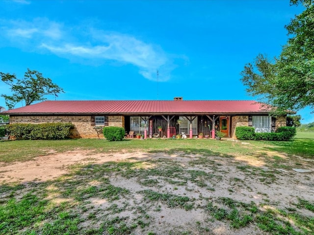1145 State Highway 21e, San Augustine, TX 75972 - single story home featuring covered porch, stone siding, and metal roof