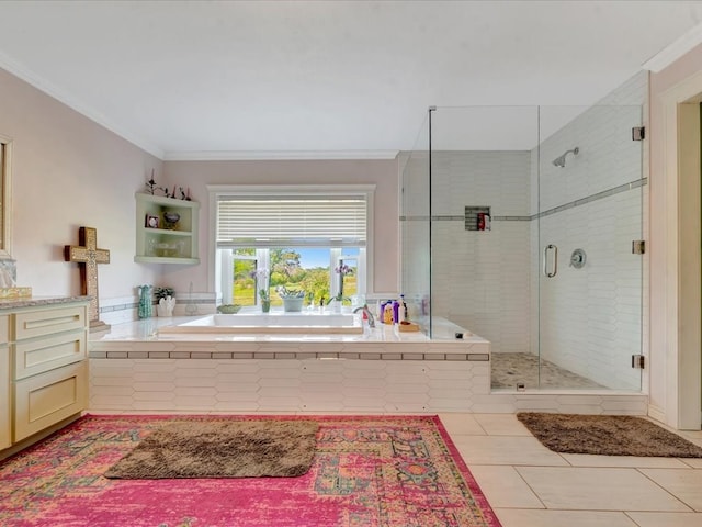 1145 State Highway 21e, San Augustine, TX 75972 - bathroom with a shower stall, a garden tub, ornamental molding, and tile patterned flooring