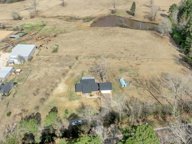 bird's eye view featuring a water view and a rural view