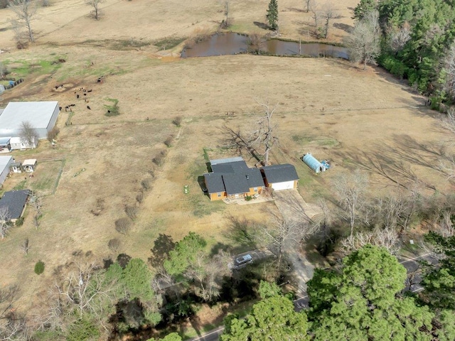 aerial view featuring a rural view and a water view