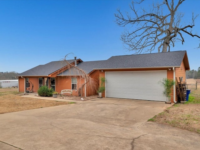 single story home with a garage