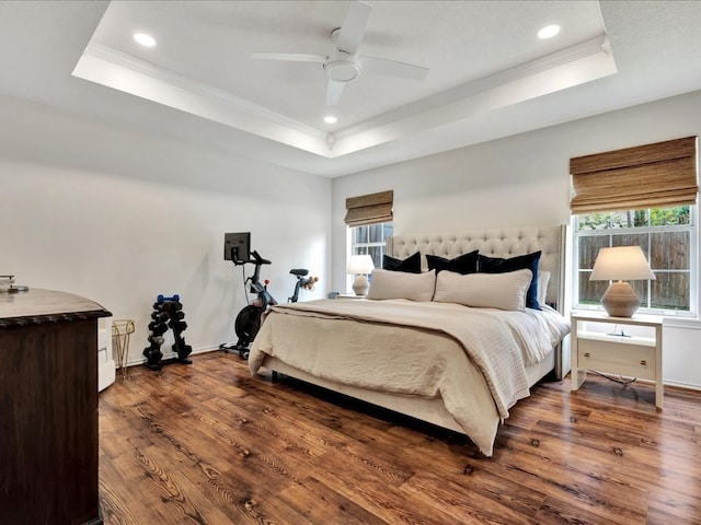 301 Sawgrass Cir, Lufkin, TX 75901 - bedroom featuring a raised ceiling, ornamental molding, multiple windows, dark wood-type flooring, and recessed lighting