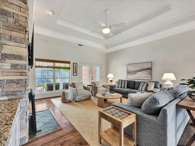 301 Sawgrass Cir, Lufkin, TX 75901 - living room with a raised ceiling, crown molding, wood finished floors, ceiling fan, and recessed lighting
