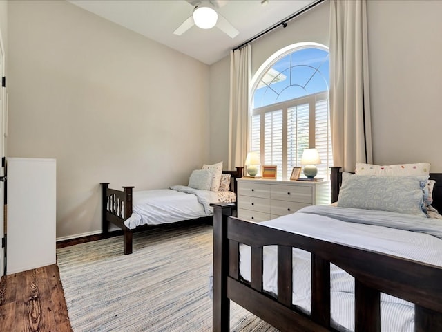 301 Sawgrass Cir, Lufkin, TX 75901 - bedroom with wood finished floors, vaulted ceiling, and ceiling fan