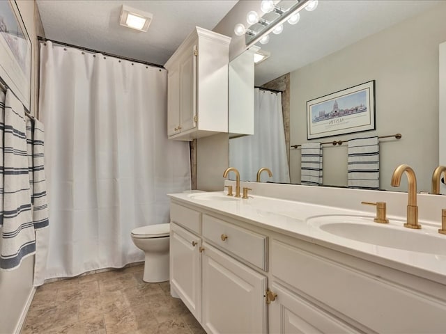 301 Sawgrass Cir, Lufkin, TX 75901 - full bathroom featuring double vanity and toilet