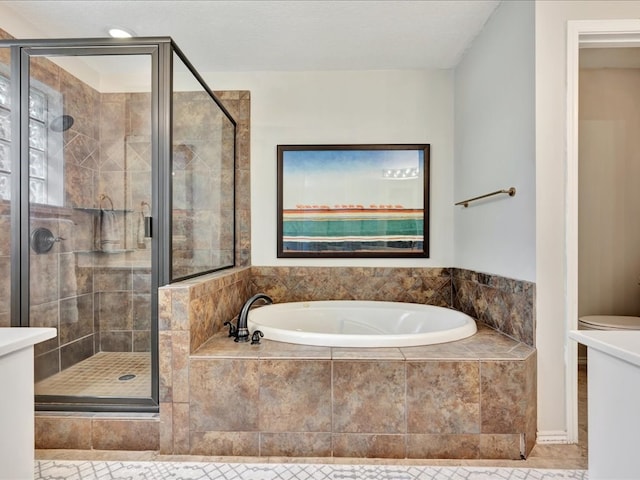 301 Sawgrass Cir, Lufkin, TX 75901 - full bath with a garden tub and a stall shower