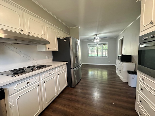 kitchen with ceiling fan, stainless steel appliances, and white cabinets