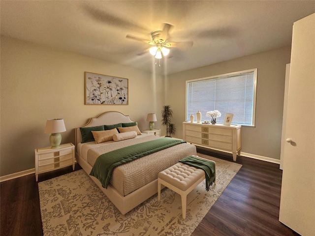 bedroom with dark wood-type flooring and ceiling fan