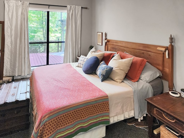 203 Bogey Ln, Brookeland, TX 75931 - bedroom featuring carpet floors