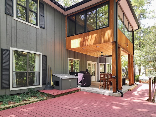 203 Bogey Ln, Brookeland, TX 75931 - wooden deck featuring a ceiling fan, outdoor dining space, and area for grilling