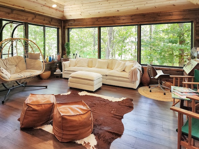 203 Bogey Ln, Brookeland, TX 75931 - living room with hardwood / wood-style flooring and wooden walls