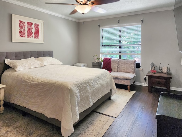 203 Bogey Ln, Brookeland, TX 75931 - bedroom with dark wood-style floors, ornamental molding, and a ceiling fan