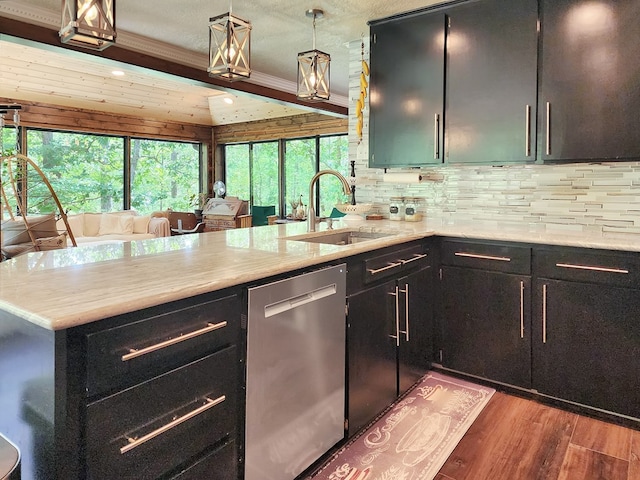 203 Bogey Ln, Brookeland, TX 75931 - kitchen with dishwasher, a peninsula, wood finished floors, decorative backsplash, and plenty of natural light