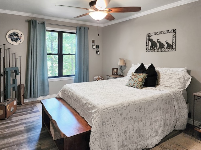 203 Bogey Ln, Brookeland, TX 75931 - bedroom with wood finished floors, crown molding, and ceiling fan