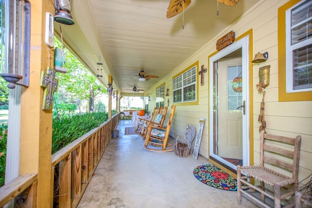 view of patio featuring ceiling fan and covered porch