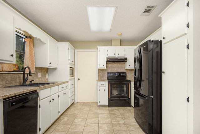 kitchen featuring sink, white cabinetry, and black appliances