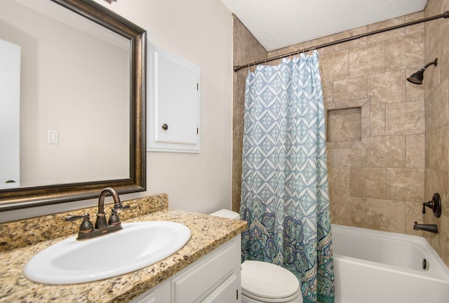 full bathroom with a textured ceiling, vanity, shower / tub combo, and toilet