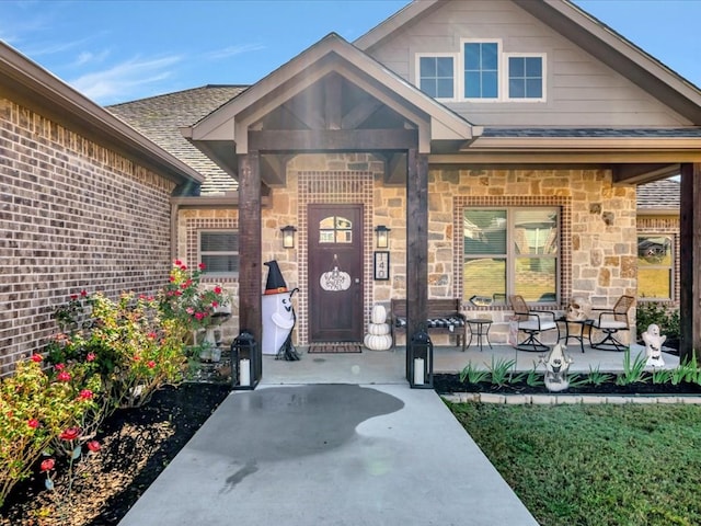 property entrance featuring covered porch