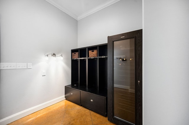 205 Twin Crk, Lufkin, TX 75904 - mudroom with ornamental molding, light tile patterned floors, and baseboards