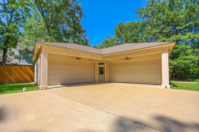 205 Twin Crk, Lufkin, TX 75904 - garage featuring fence and concrete driveway
