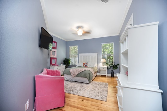 205 Twin Crk, Lufkin, TX 75904 - bedroom with ornamental molding, light wood-type flooring, and ceiling fan