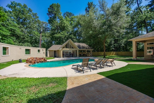 205 Twin Crk, Lufkin, TX 75904 - view of pool with a patio, view of scattered trees, and an outbuilding
