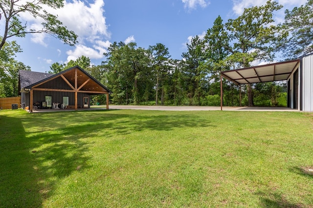 190 Whitehead Dr, Diboll, TX 75941 - view of grassy yard with a carport