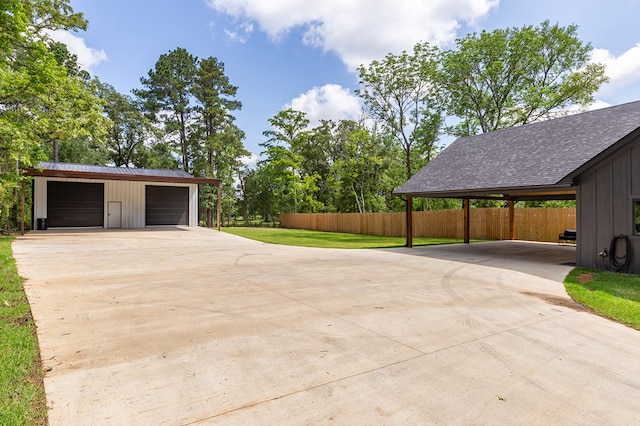 190 Whitehead Dr, Diboll, TX 75941 - detached garage with a carport