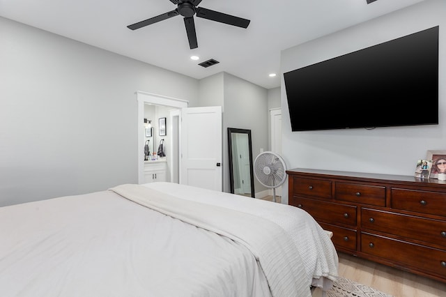 190 Whitehead Dr, Diboll, TX 75941 - bedroom with light wood-type flooring, recessed lighting, connected bathroom, and ceiling fan