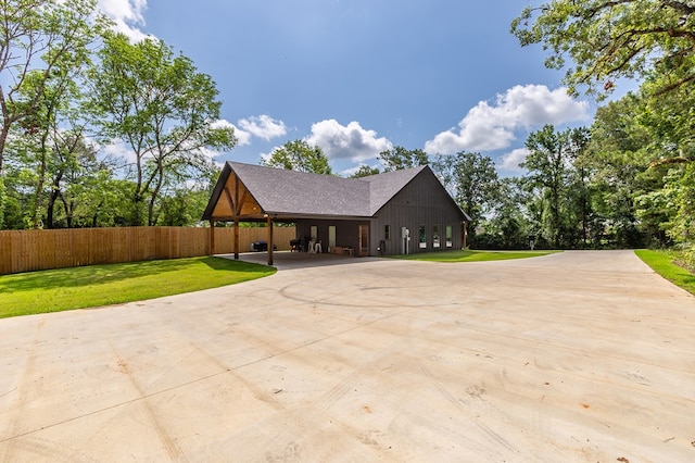 190 Whitehead Dr, Diboll, TX 75941 - view of front facade with curved driveway and a carport