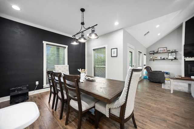 1065 Cc Rd, Diboll, TX 75941 - dining area featuring wood finished floors, recessed lighting, and vaulted ceiling