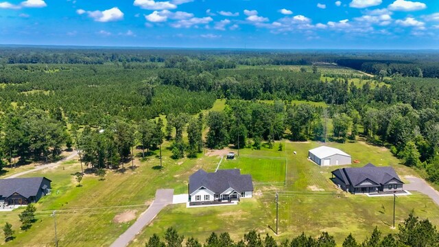 1065 Cc Rd, Diboll, TX 75941 - aerial view of property and surrounding area featuring a forest