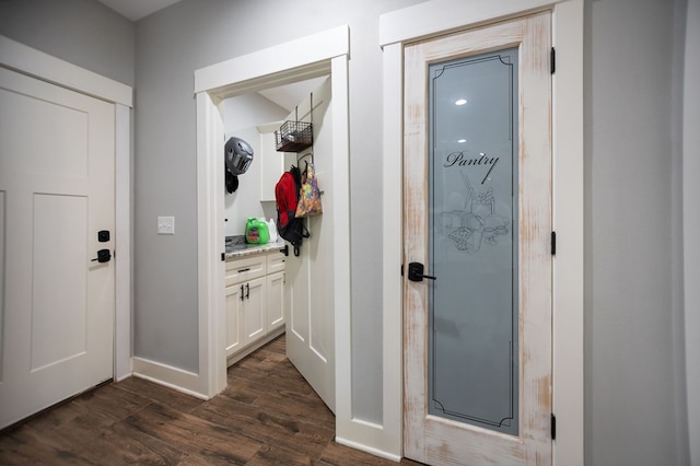 1065 Cc Rd, Diboll, TX 75941 - hall featuring dark wood-type flooring and baseboards