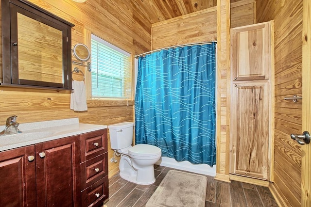 full bathroom with hardwood / wood-style floors, wood walls, toilet, and shower / bath combo with shower curtain