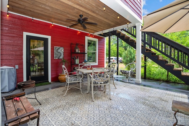 310 N Mound St, Nacogdoches, TX 75961 - view of patio / terrace with stairs, a ceiling fan, and outdoor dining space