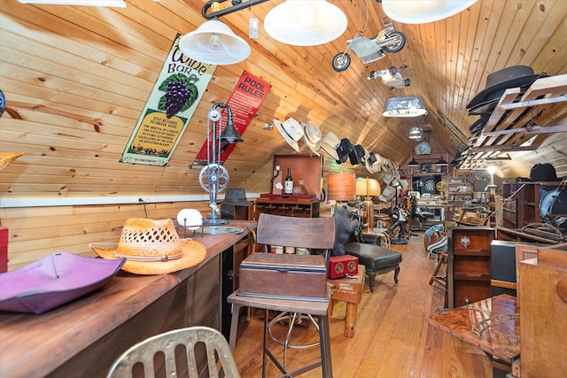 310 N Mound St, Nacogdoches, TX 75961 - dining space featuring hardwood / wood-style floors, wood walls, wood ceiling, and lofted ceiling
