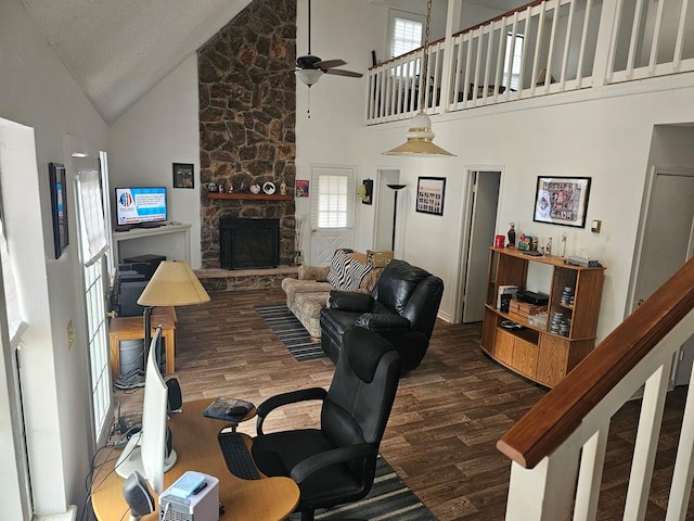 2540 Brentwood Dr, Lufkin, TX 75901 - living area with high vaulted ceiling, wood finished floors, ceiling fan, and a fireplace