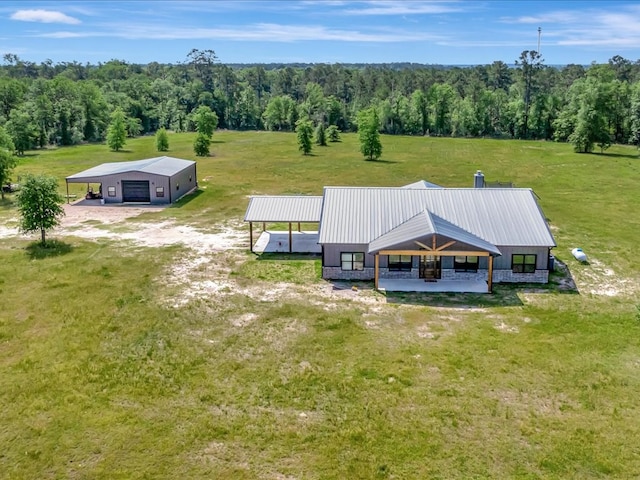 drone / aerial view with a forest view