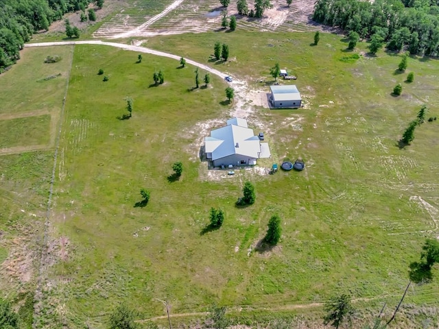 birds eye view of property featuring a rural view