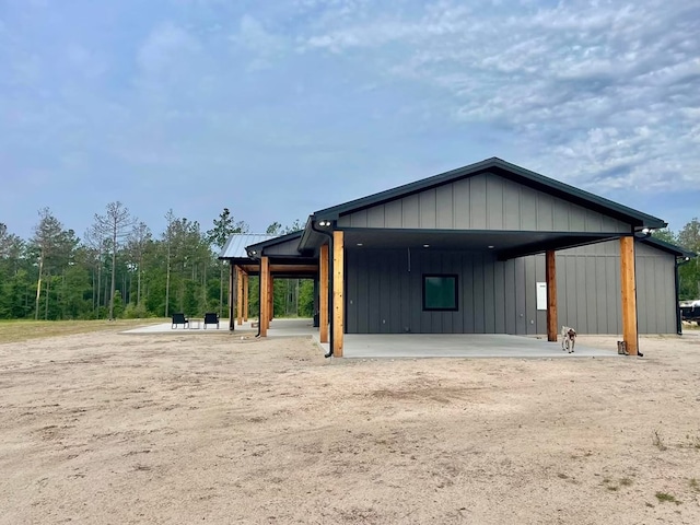 view of outbuilding featuring a carport