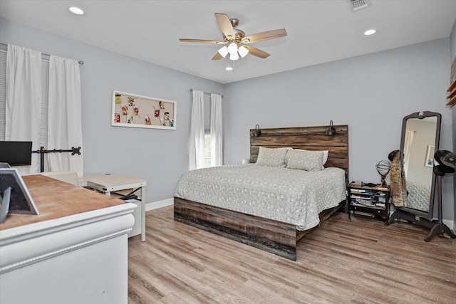 1755 Cc Rd, Diboll, TX 75941 - bedroom with light wood-style flooring, recessed lighting, and a ceiling fan