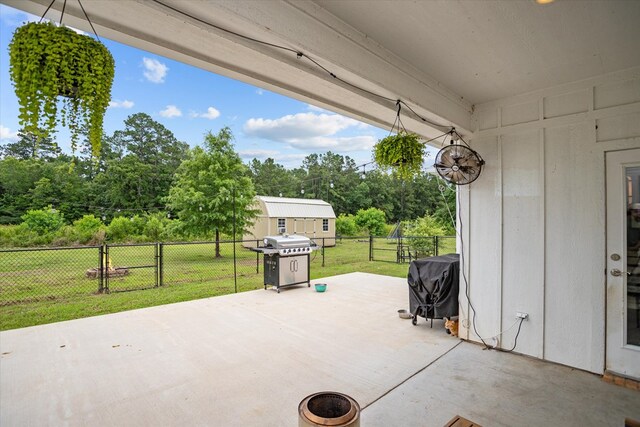 1755 Cc Rd, Diboll, TX 75941 - view of patio featuring area for grilling and view of wooded area