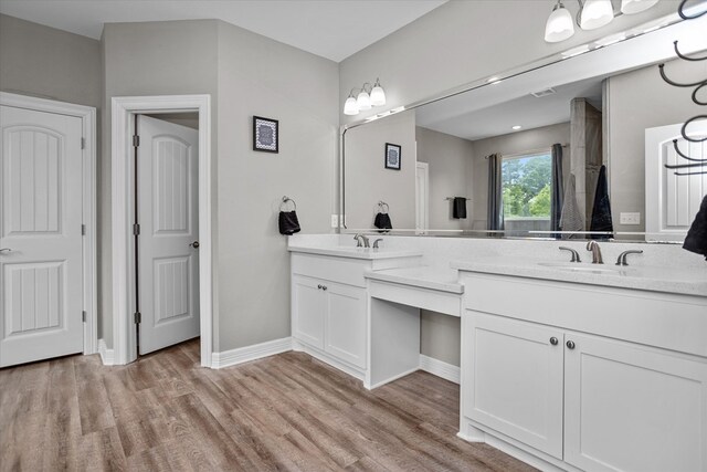 1755 Cc Rd, Diboll, TX 75941 - full bath featuring double vanity and wood finished floors