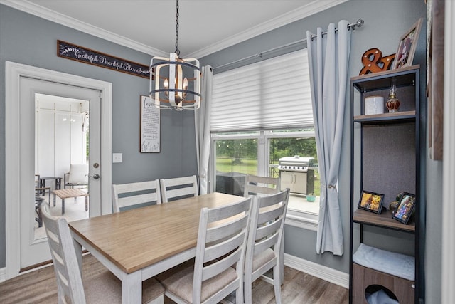 1755 Cc Rd, Diboll, TX 75941 - dining space with a chandelier, crown molding, and wood finished floors