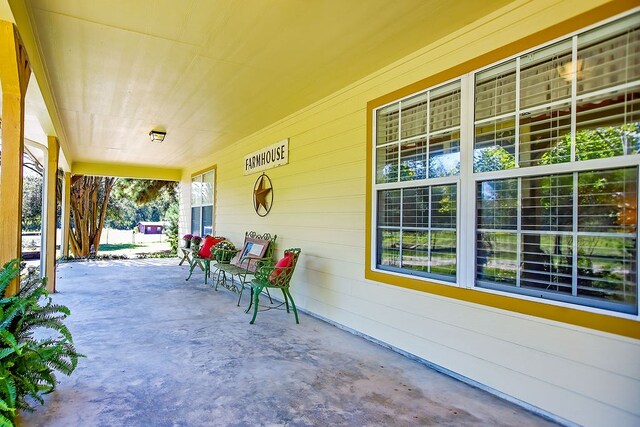 view of patio featuring a porch