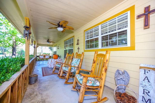 view of patio with a porch and a ceiling fan